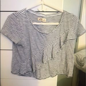 Small Black and White striped shirt.